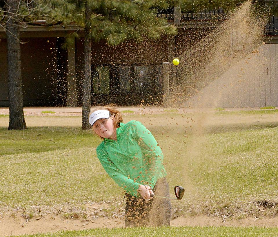 Clark-Willow Lake's Brynn Roehrich hits out the bunker on No. 5 Yellow during the 2022 Great Plains Lutheran Invitational girls and boys golf tournament at the Cattail Crossing Golf Course.