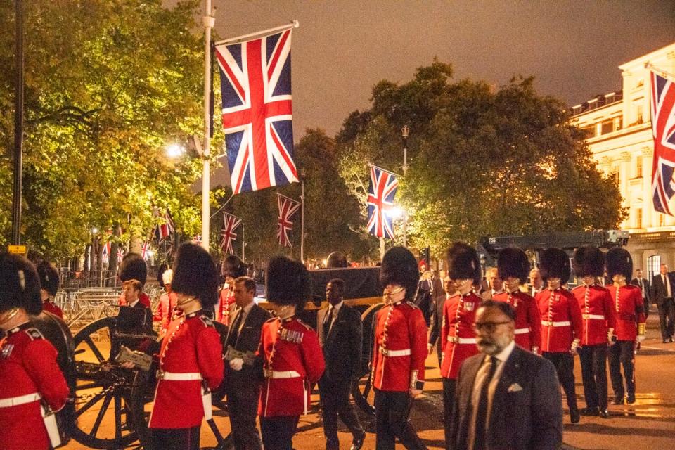 An early morning rehearsal for the procession of Queen Elizabeth’s coffin from Buckingham Palace to Westminster Hall, London, where it will lie in state until her funeral on Monday. (Jeremy Selwyn)