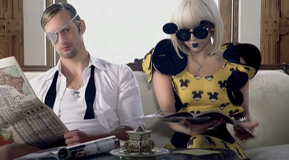 Alexander next to Lady Gaga with an eye patch in the music video