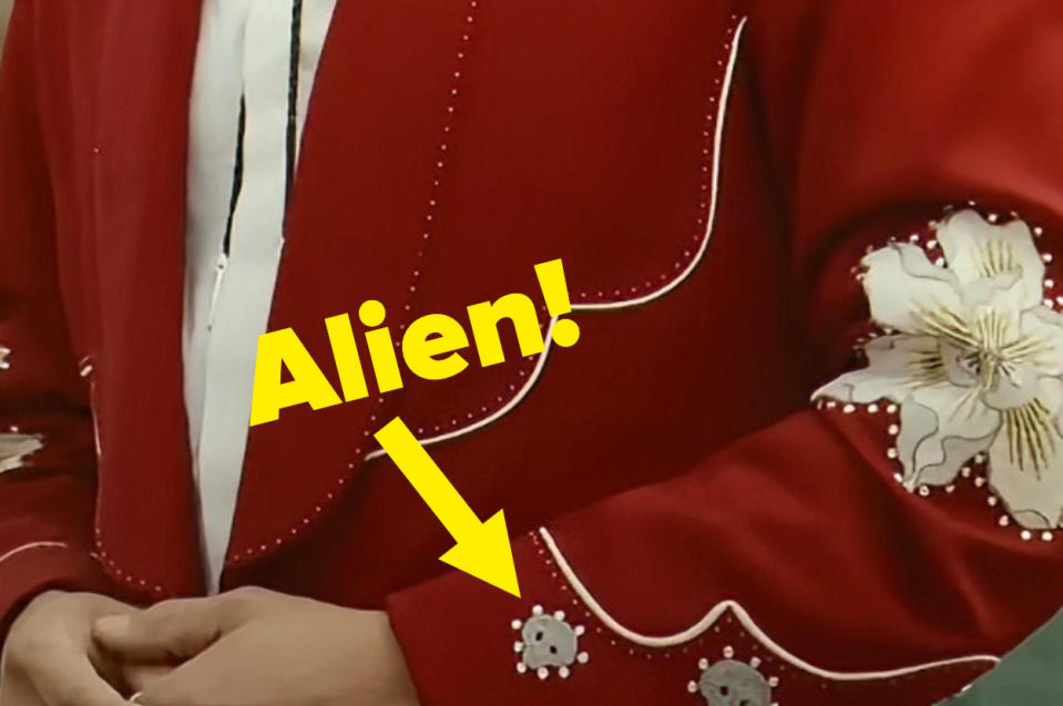 Detail on Ricky's suit that shows an alien head pattern