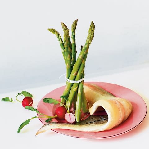 bundle of asparagus with haddock - Credit: Yuki Sugiura