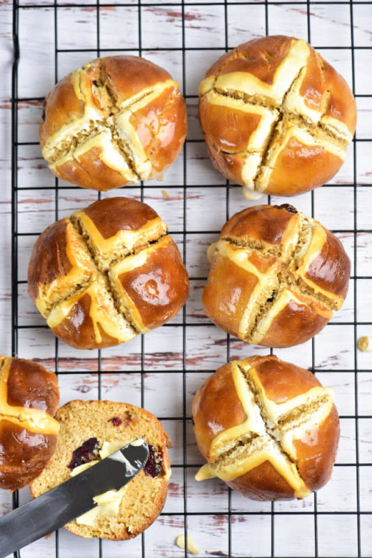 <p>Sims Home Kitchen</p><p>Celebrate Easter with these delicious Gluten-Free Hot Cross Buns! They're fresh, fluffy and are sure to impress your family and friends. Prepare them in 15 minutes and bake for just 20 minutes. Serve with butter or any other spread of your choice.</p><p><strong>Get the recipe: <a href="https://simshomekitchen.com/gluten-free-hot-cross-buns/" rel="nofollow noopener" target="_blank" data-ylk="slk:Gluten-Free Hot Cross Buns;elm:context_link;itc:0;sec:content-canvas" class="link ">Gluten-Free Hot Cross Buns</a></strong></p>