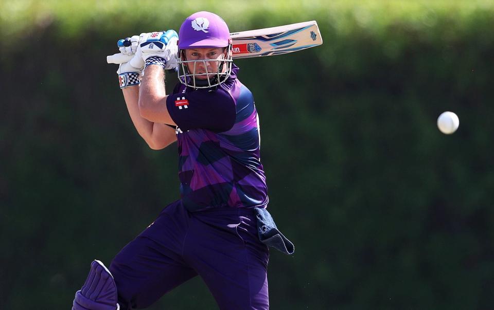 George Munsey hits the ball to the boundary - GETTY IMAGES