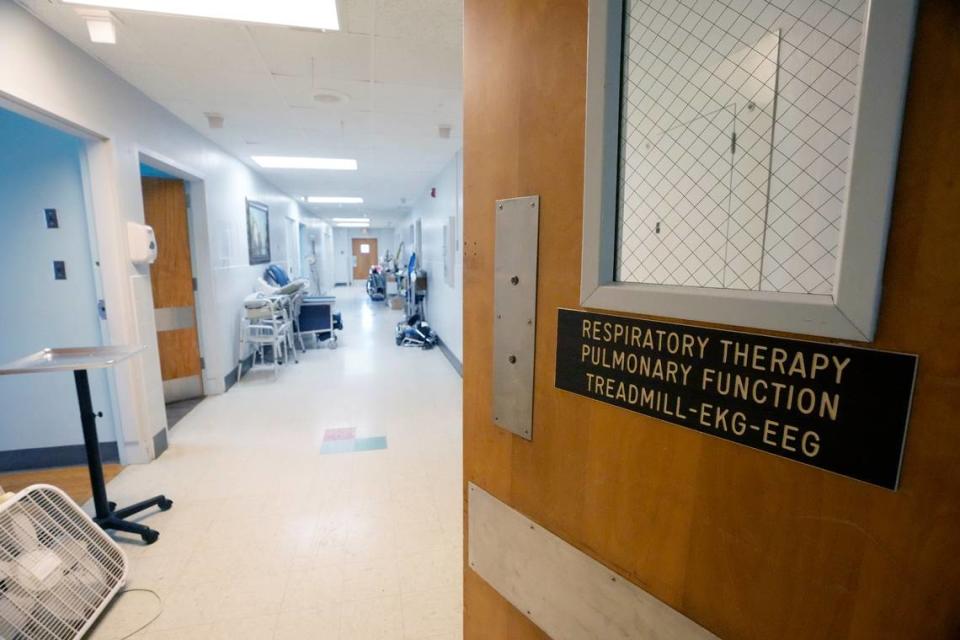 Unused equipment lines the hallway of the Alliance Healthcare System hospital in Holly Springs.