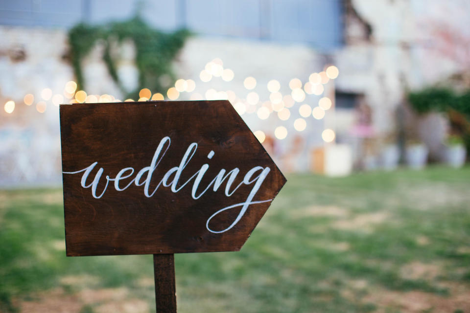 A sign saying, "wedding"
