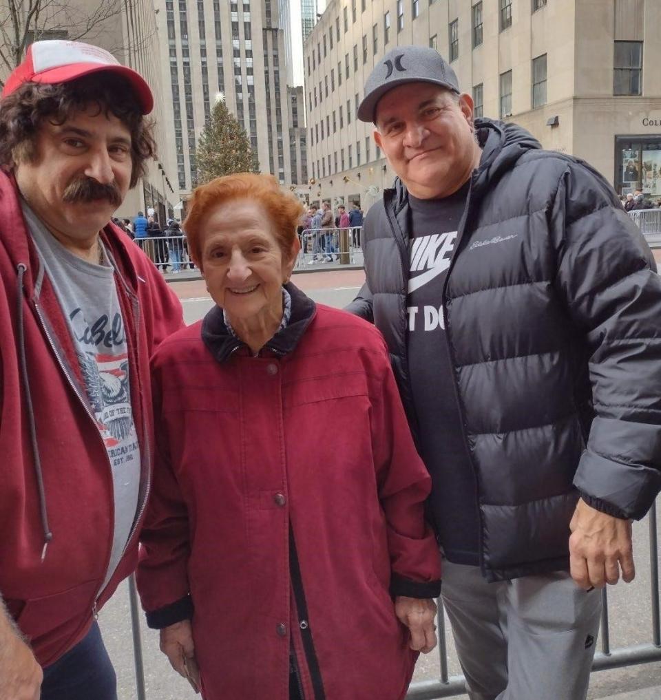 John Cusmano (left) with his brother Rick Cusmano (right) and their mother Dolly Cusmano.