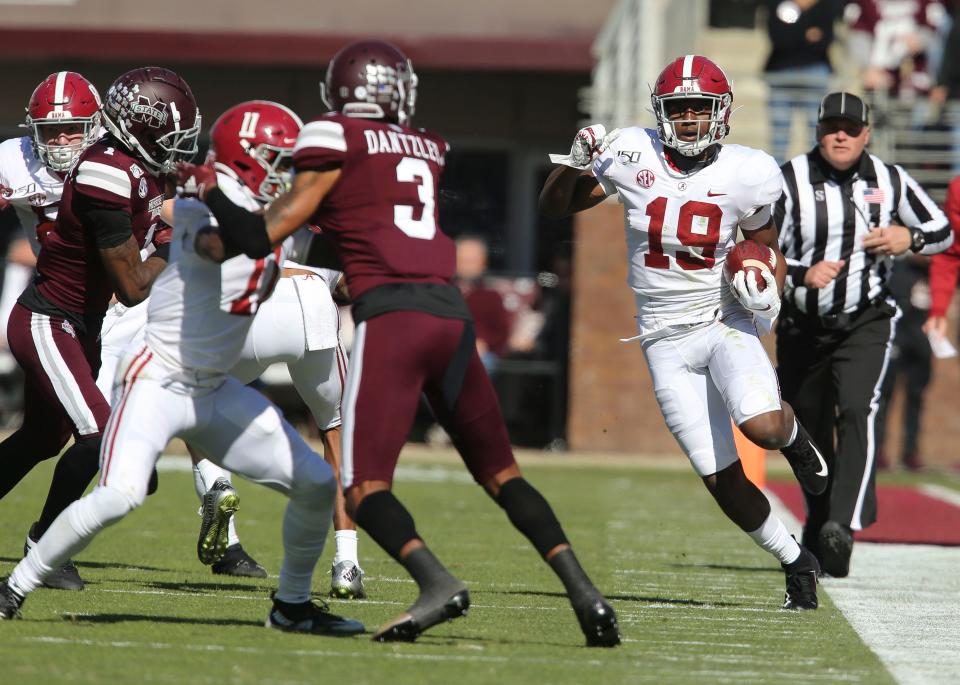 Alabama tight end Jahleel Billingsley (19) tight ropes the sideline as he gains a first down against Mississippi State Saturday, Nov. 16, 2019 in Starkville. [Staff Photo/Gary Cosby Jr.]