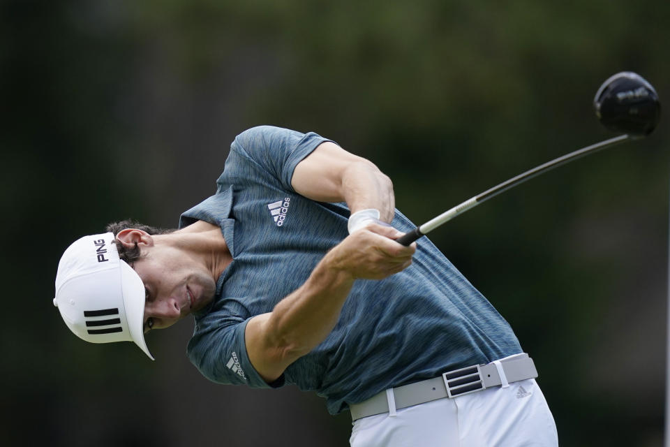 Joaquin Niemann of Chile drives off the fourth tee during the third round of the Rocket Mortgage Classic golf tournament, Saturday, July 3, 2021, at the Detroit Golf Club in Detroit. (AP Photo/Carlos Osorio)