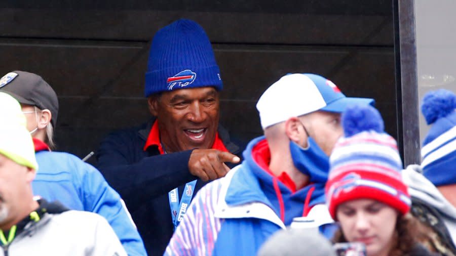 Buffalo Bills Hall of Fame running back O.J. Simpson with fans prior to an NFL football game against the Miami Dolphins, Sunday, Oct. 31, 2021, in Orchard Park, N.Y. (AP Photo/Jeffrey T. Barnes)