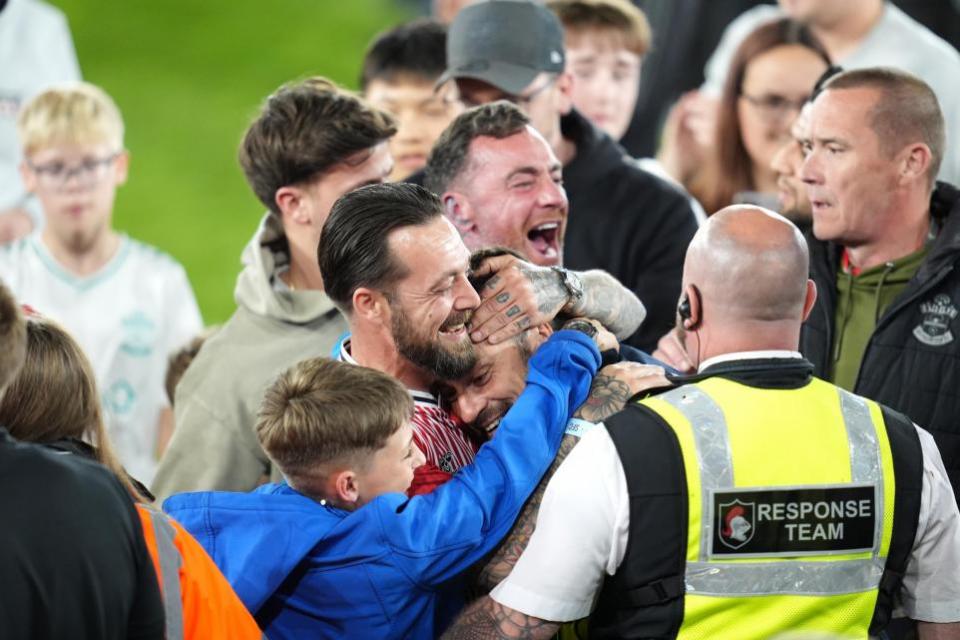 Daily Echo: Boss Russell Martin celebrated with family after Friday's win