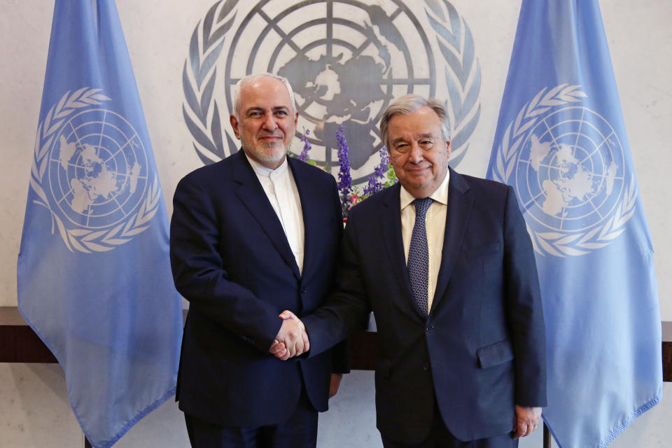 Iranian Foreign Minister Mohammad Javad Zarif, left, shakes hands with U.N. Secretary General Antonio Guterres at United Nations headquarters Thursday, July 18, 2019. (AP Photo/Frank Franklin II)