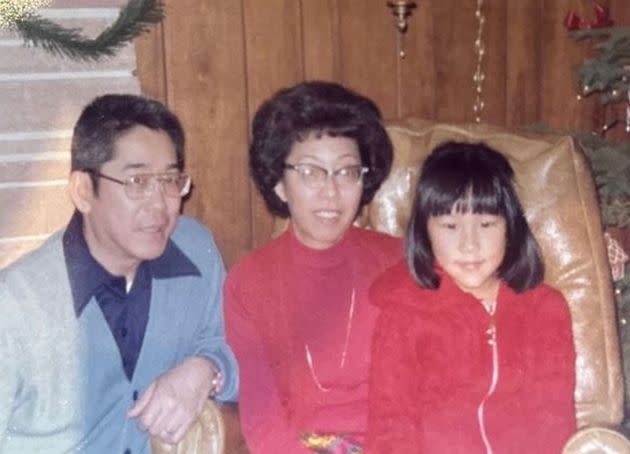 The author (right) as a child with Henry and Lilian Aoyama, her adoptive parents, both of whom are now deceased.
