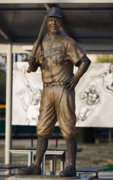 The Wichita Police Department is asking the public for help in identifying thieves they say stole a Jackie Robinson memorial statue from a youth baseball field on Jan. 24, 2024. The suspects, police said, knocked down the bronze statue in McAdams Park and took off in a silver, four-door truck.