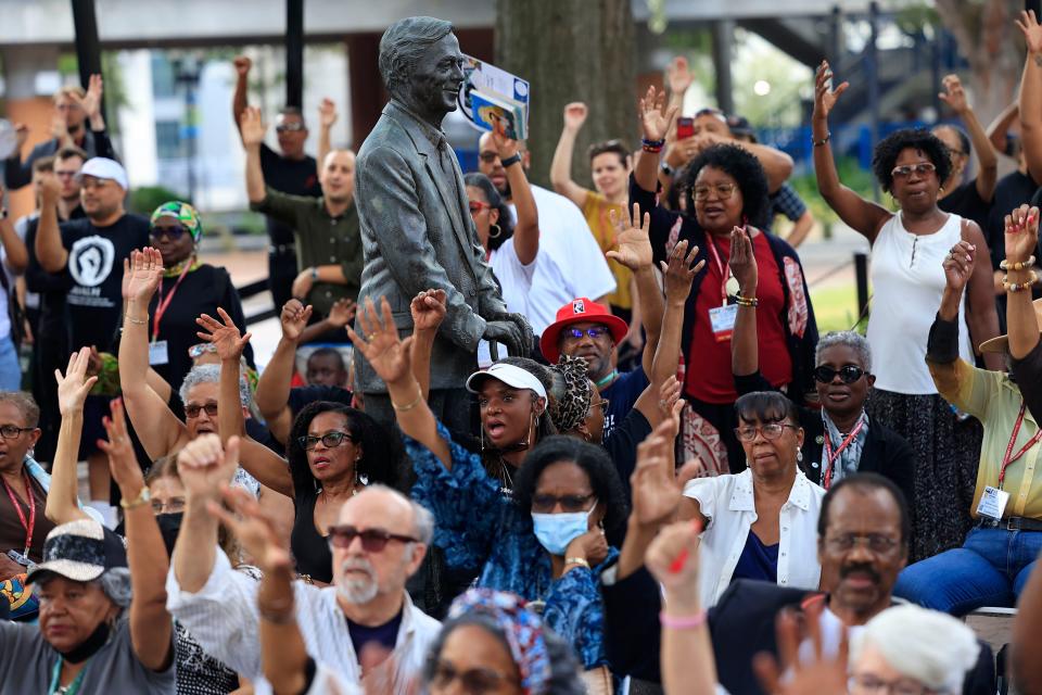 Participants joined a “Banned Book Readout” sponsored by the Association for the Study of African American Life and History  Sept. 21, 2023 at the James Weldon Johnson Park in Jacksonville, Florida. The organization held its annual conference in Jacksonville that week.