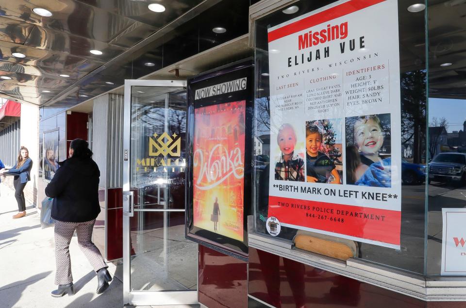 A woman leaves the Mikadow Theatre after attending a meeting for people wishing to volunteer in the search for missing 3-year-old Elijah Vue Tuesday, Feb. 27, 2024, in Manitowoc, Wis.