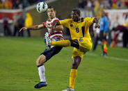 TAMPA, FL - JUNE 08: Defender Carlos Bocanegra #3 of Team USA battles midfielder Mikele Leigertwood #8 of Team Antigua and Barbuda for the ball during the FIFA World Cup Qualifier Match at Raymond James Stadium on June 8, 2012 in Tampa, Florida. (Photo by J. Meric/Getty Images)