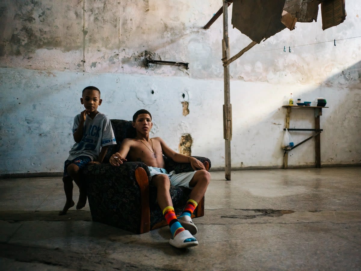 Two boys in an abandoned building in neighbourhood Centro Habana of Havana, Cuba (James Clifford Kent/The Conversation)