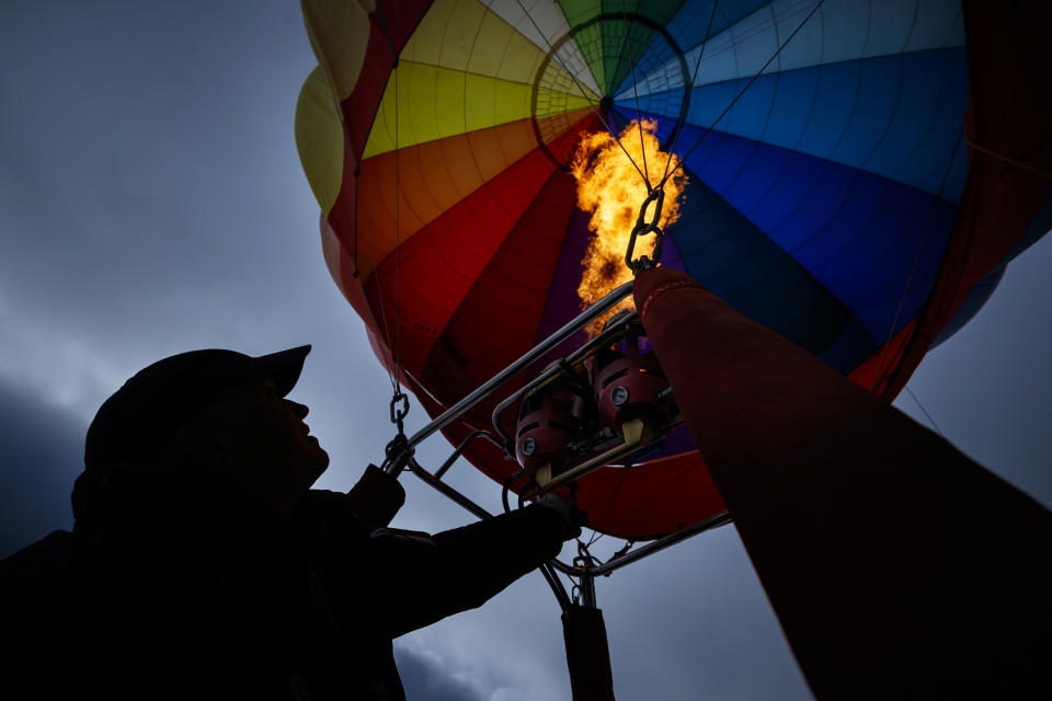 Inflation is showing signs of heating up. But should investors be concerned? (Valentin Flauraud/Keystone via AP)