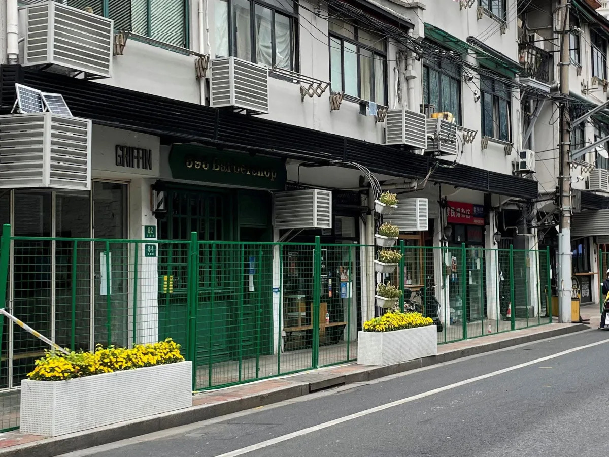 Shanghai installs metal barriers and fences around people's homes to stop them f..