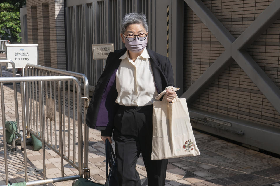 Barrister Margaret Ng arrives at the West Kowloon Magistrates' courts in Hong Kong Monday, Sept. 26, 2022. Ng was among some arrested along with 90-year-old Catholic Cardinal Joseph Zen in May on suspicion of colluding with foreign forces to endanger China's national security. (AP Photo/Oiyan Chan)