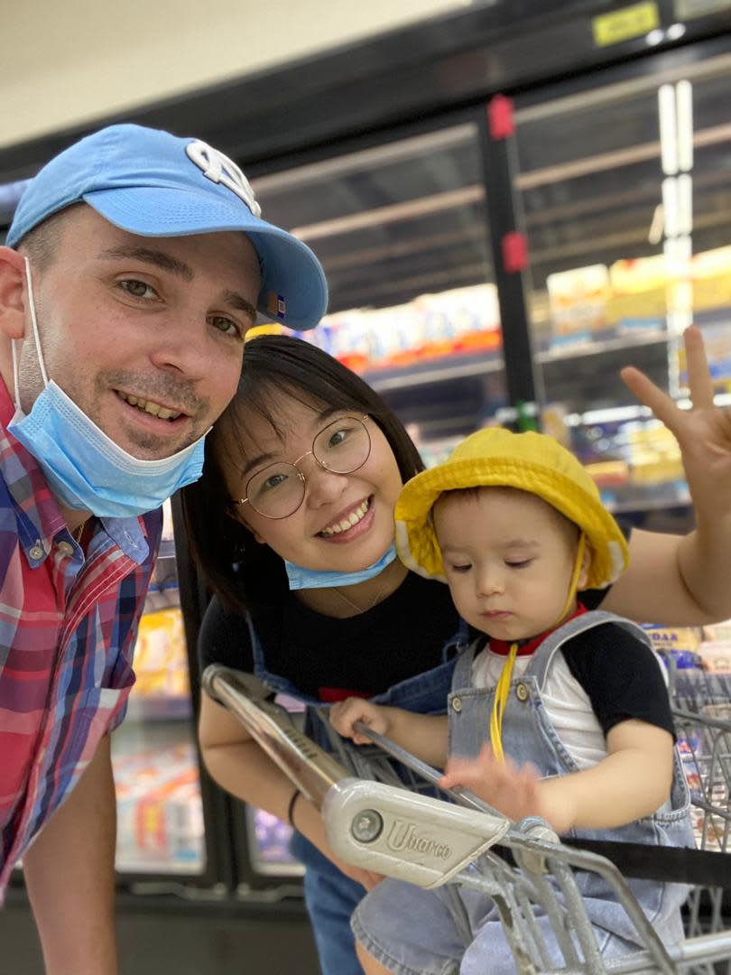 Image: Christopher Suzanne with his wife and son in the U.S. (NBC News)