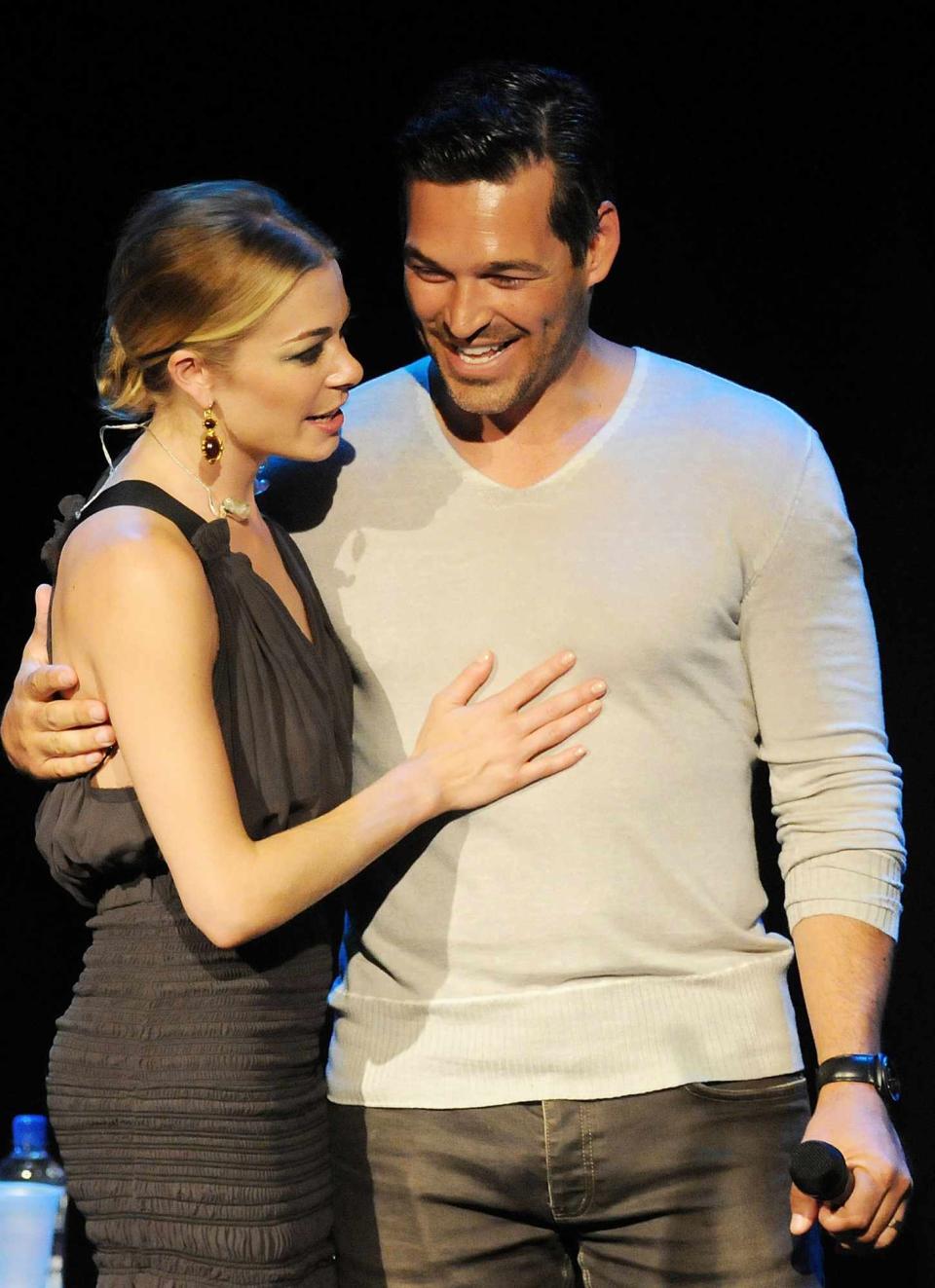 LeAnn Rimes (L) and husband actor Eddie Cibrian speak during an acoustic presentation to assist victims of the recent tornadoes in Alabama at the Ponte Vedra Concert Hall on June 5, 2011 in Ponte Vedra Beach, Florida