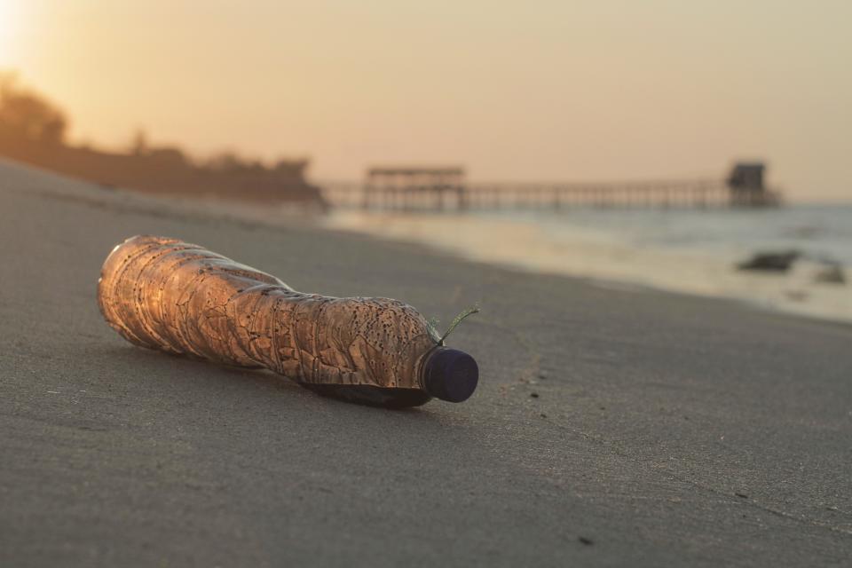 the trash bottles on the beach