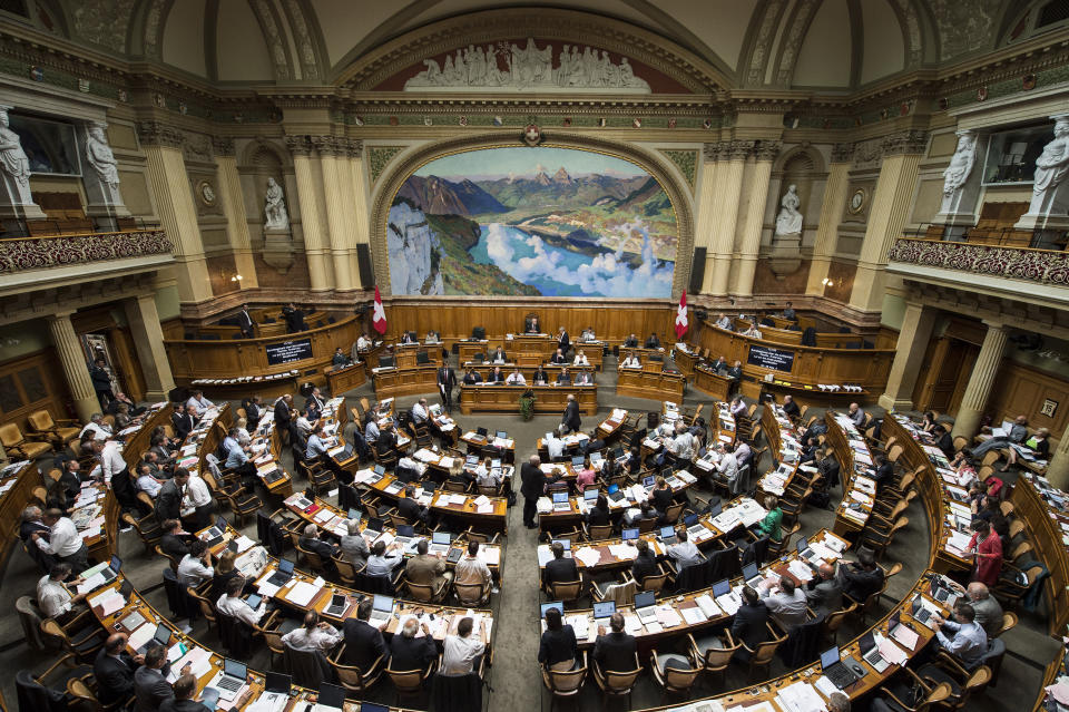 FILE - An overview of the Swiss parliament in Bern, Switzerland, Sept. 15, 2014. The lower house of Swiss parliament is following in the footsteps of the Senate, or upper house, and has approved a measure that would ban the use of, public wearing or display of Nazi and racist symbols that could foment extremist hate or violence, it was reported on Wednesday, April 17, 2024. The proposal, years in the making, goes beyond a simple ban on Nazi memorabilia, which had failed in the past in parliament, to include other forms of extremist symbols that could stir hatred or violence. (Peter Schneider/Keystone via AP, File)