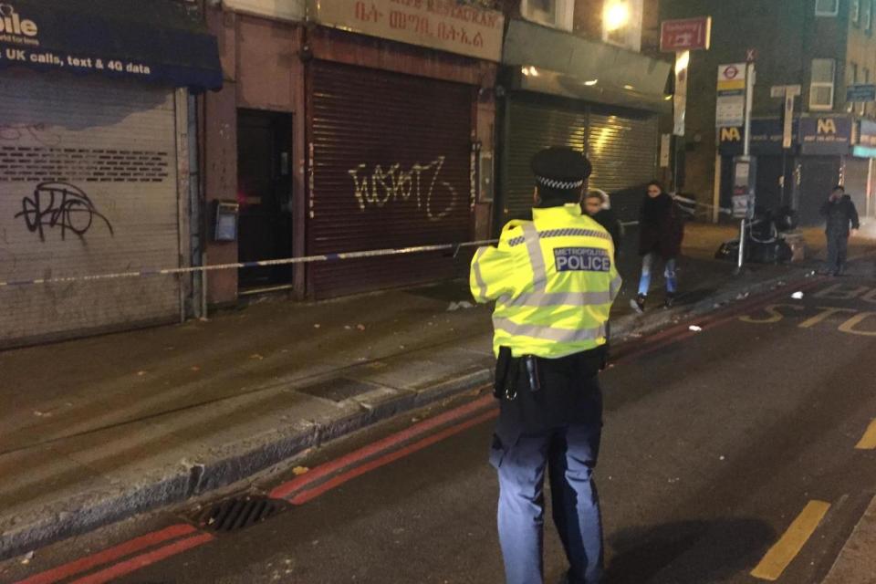 Murder probe: Police were called to the scene after the father was critically injured in the attack at the Begel Cafe in Finsbury Park