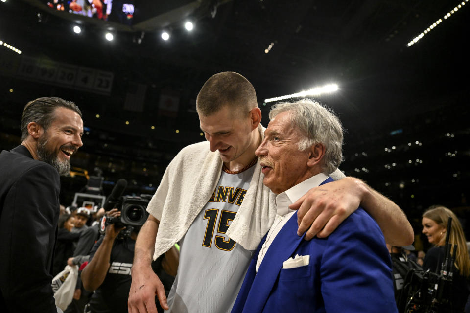 LOS ANGELES, CA - MAY 22: Nikola Jokic (15) of the Denver Nuggets celebrates with team governor Josh Kroenke and team owner Stan Kroenke after the fourth quarter of the Nuggets' 113-111 Western Conference finals game 4 win over the Los Angeles Lakers at Crypto.com Arena in Los Angeles on Monday, May 22, 2023. The Nuggets swept the best-of-seven series 4-0 to advance to their first NBA Finals in franchise history. (Photo by AAron Ontiveroz/The Denver Post)