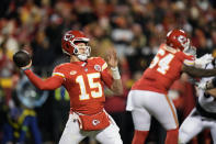 Kansas City Chiefs quarterback Patrick Mahomes (15) throws during the second half of an NFL football game against the Cincinnati Bengals Sunday, Dec. 31, 2023, in Kansas City, Mo. (AP Photo/Charlie Riedel)