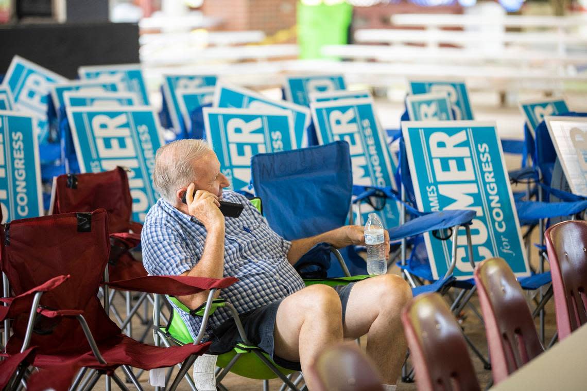 People gather to eat barbecue, play carnival games and bingo before politicians and candidates delver speeches during the 142nd annual St. Jerome picnic in Fancy Farm, Ky., Saturday, August 6, 2022.