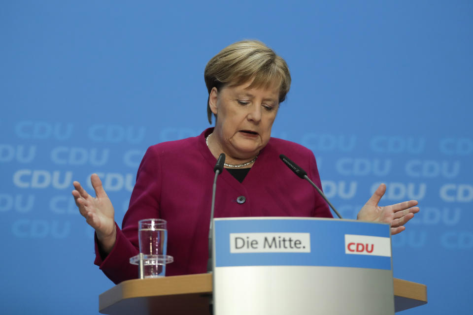 German Christian Democratic Party, CDU, chairwoman and Chancellor Angela Merkel addresses the media during a news conference after a party's leaders meeting at the headquarters the in Berlin, Germany, Monday, Oct. 29, 2018. (AP Photo/Markus Schreiber)