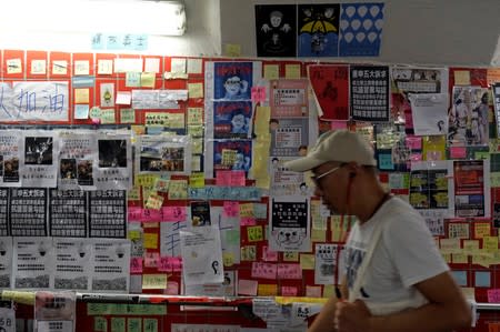 Memos and posters over anti-extradition bill are seen on "Lennon Walls" at Tai Po in Hong Kong