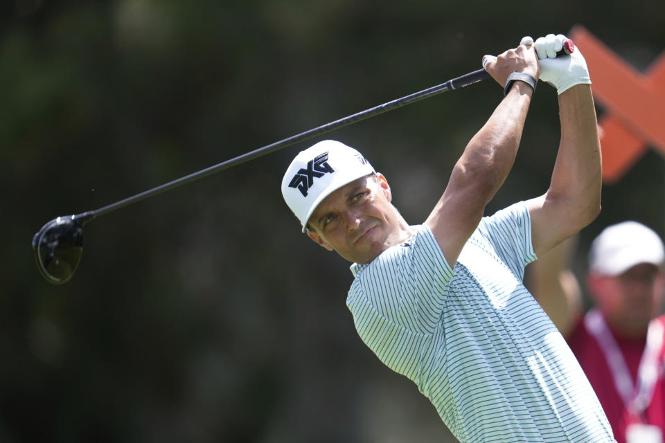 Eric Cole hits off the fourth tee during the first round of the Rocket Mortgage Classic golf tournament at Detroit Country Club, Thursday, June 27, 2024, in Detroit. (AP Photo/Paul Sancya)