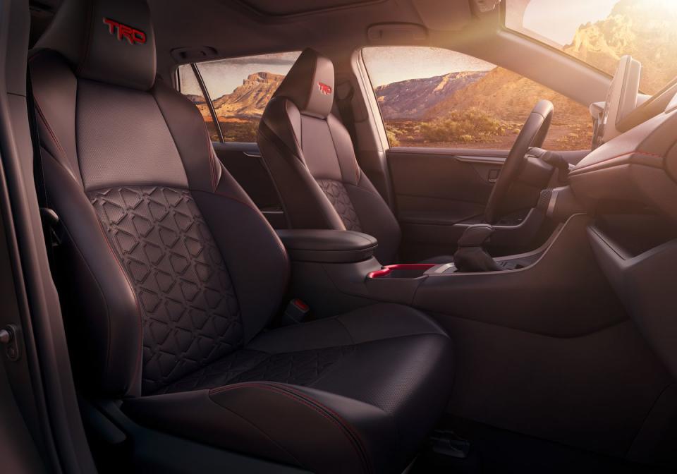 <p>Toyota also gussied up the interior–albeit only slightly–with faux-leather seating surfaces, red contrast stitching, red interior trim, and embroidered TRD logos in the headrests.</p>