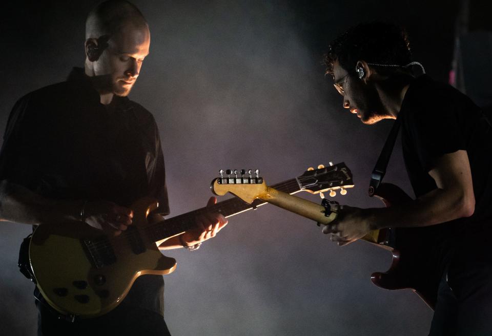 Matty Healy, right, and Adam Hann of The 1975 perform with the band on the second day of the second weekend of Austin City Limits Music Festival, Saturday Oct. 14, 2023.