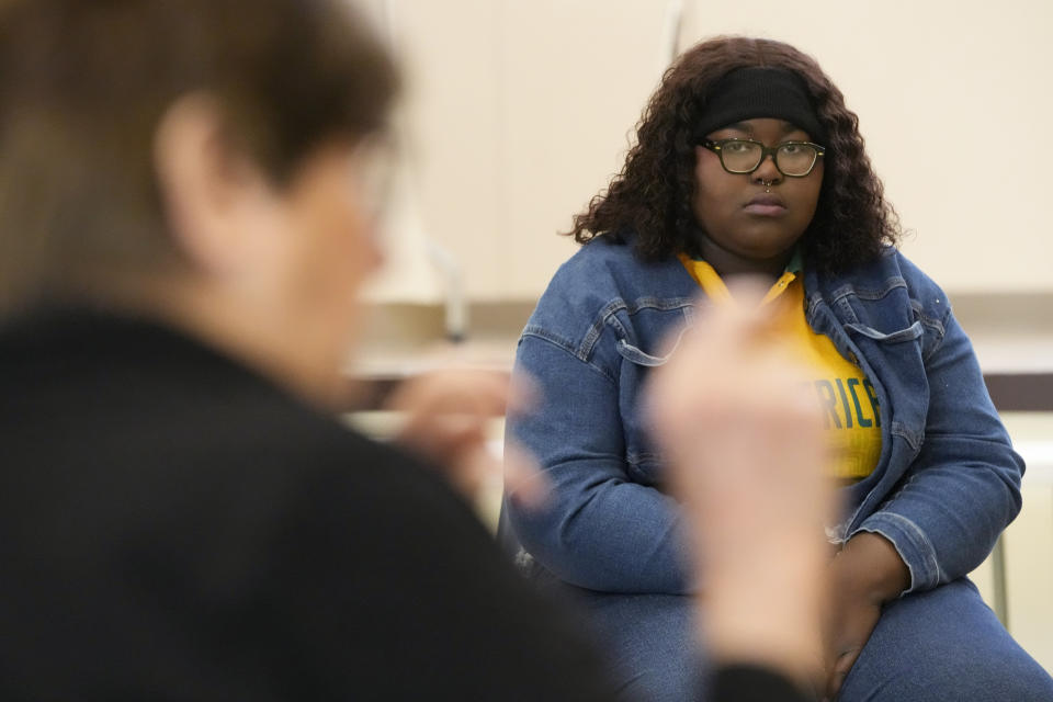 DePaul student Nana Ampoto listens to Sister Helen Prejean during a book club at Department Of Corrections Division 11 in Chicago, Monday, April 22, 2024. DePaul students and detainees are currently reading Dead Man Walking and the author, anti death penalty advocate, Sister Helen Prejean attended to lead a discussion. (AP Photo/Nam Y. Huh)