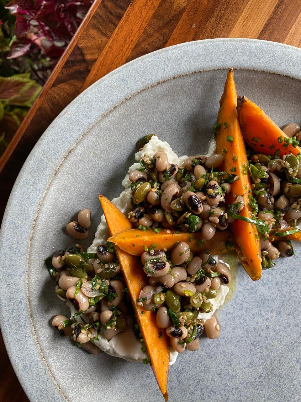 Black eyed peas and sweet potato salad prepared at The Garage at Victory North.