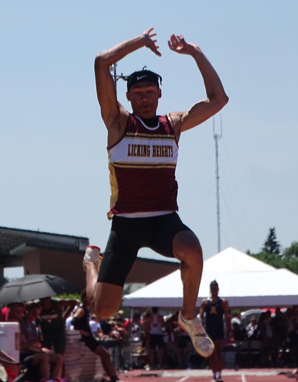 Licking Heights junior D.J. Fillmore competes in the long jump during the Division I state championships at Jesse Owens Memorial Stadium on Saturday, June, 4, 2022. Fillmore jumped 24-feet-11 to win the title.