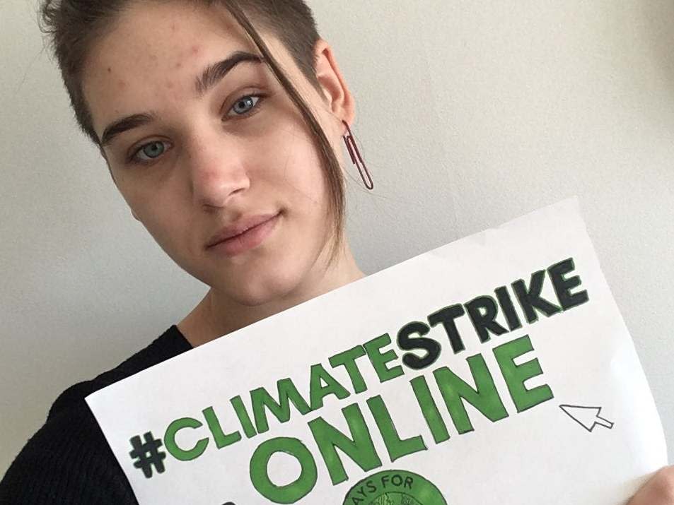 Isabelle Axelsson, one of hundreds of young demonstrators posting photos of themselves online using the hashtag #ClimateStrikeOnline, after Greta Thunberg encouraged youngsters to take their protests to Twitter rather than the streets amid the coronavirus outbreak: PA