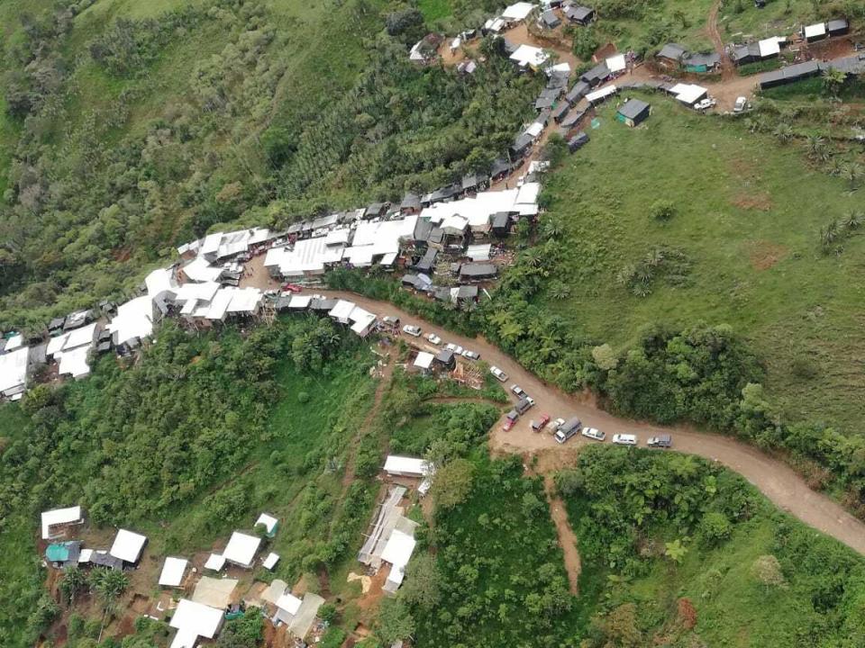 This photo released by Ecuador's National Police shows a settlement created by illegal gold miners, during a police raid on the area in Buenos Aires, Ecuador, Tuesday, July 2, 2019. Independent miners have flocked to this area since gold was discovered in late 2017, before organized crime groups moved in to take control and, according to police, expand their list of crimes, including homicide to extortion to trafficking in people. (Ecuador National Police via AP)