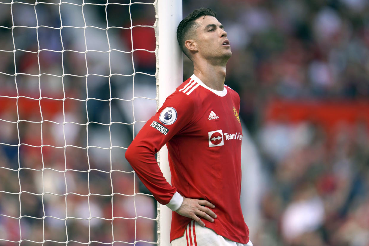 FILE- Manchester United's Cristiano Ronaldo rests against a goalpost during the English Premier League soccer match between Manchester United and Norwich City at Old Trafford stadium in Manchester, England, on April 16, 2022. A Nevada woman has lost her bid in a U.S. court to force international soccer star Cristiano Ronaldo to pay millions of dollars more than the $375,000 in hush money she received after claiming he raped her in Las Vegas in 2009. (AP Photo/Jon Super, File)