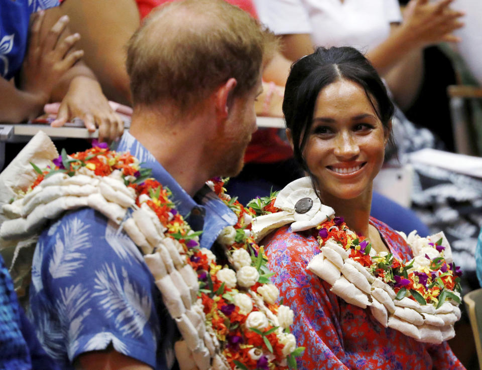 Britain's Prince Harry and Meghan, Duchess of Sussex, at the University of the South Pacific in Suva, Fiji, Wednesday, Oct. 24, 2018. Prince Harry and his wife Meghan are on day nine of their 16-day tour of Australia and the South Pacific (Phil Noble/Pool Photo via AP)