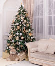 <p>As you set up the tree, don't forget the oldie, but goodie trick of placing a tree bag beneath your Frasier Fir (or evergreen of your choice) to make future cleanup easier. Keep it covered with the tree skirt and no one will be the wiser (until disposal day comes around!).</p> <p>Keep the tree well-watered (it needs about a gallon a day) to keep it healthy and to prevent more needles from falling. Once you've got it all set up, if those vintage ornaments seem a little dull, revive their shine by applying a coat of clear or glittery nail polish. Voila--shiny as new!</p>