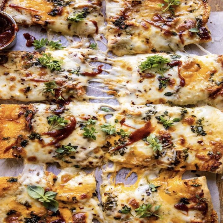 We are big pizza people in my home — specifically homemade pizza. And until I get my hands on a pizza oven, this sheet pan recipe recipe is a great option to feed a big crowd. The BBQ is a great change up from the ordinary cheese and pepperoni.Recipe: BBQ Chicken Pizza