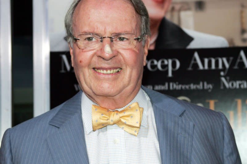 Charles Osgood (pictured 2009) worked at CBS News for 45 years. He died Tuesday from complications of dementia, his family said. File Photo by Laura Cavanaugh/UPI