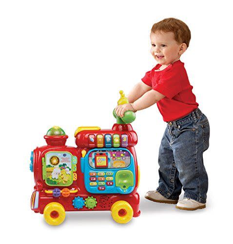 <p><strong>VTech</strong></p><p>amazon.com</p><p><strong>$47.78</strong></p><p><a href="https://www.amazon.com/dp/B00ZCZU71U?tag=syn-yahoo-20&ascsubtag=%5Bartid%7C10055.g.34425717%5Bsrc%7Cyahoo-us" rel="nofollow noopener" target="_blank" data-ylk="slk:Shop Now;elm:context_link;itc:0;sec:content-canvas" class="link ">Shop Now</a></p><p>Young ones can start exploring the Ultimate Alphabet Train during floor play and transition into ride-on fun as they grow and develop. The train includes ten activities to engage role-play (walkie-talkies!), encourage motor development (gears and blocks), and invite educational learning (numbers, animals, colors and more). <strong>The interactive train will keep your little conductor engaged with over 100 songs, melodies, sounds and phrases. </strong><br><strong><br>Ages: </strong>1-3 years old </p>