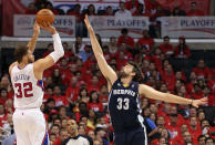 LOS ANGELES, CA - MAY 11: Blake Griffin #32 of the Los Angeles Clippers shoots over Marc Gasol #33 of the Memphis Grizzlies in the first quarter in Game Six of the Western Conference Quarterfinals in the 2012 NBA Playoffs on May 11, 2012 at Staples Center in Los Angeles, California. NOTE TO USER: User expressly acknowledges and agrees that, by downloading and or using this photograph, User is consenting to the terms and conditions of the Getty Images License Agreement. (Photo by Stephen Dunn/Getty Images)