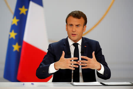 French President Emmanuel Macron speaks during a news conference to unveil his policy response to the yellow vests protest, at the Elysee Palace in Paris, France, April 25, 2019. REUTERS/Philippe Wojazer